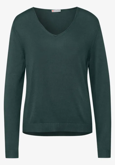 Dunkelgrüner Damenpullover mit V-Ausschnitt und langen Ärmeln.